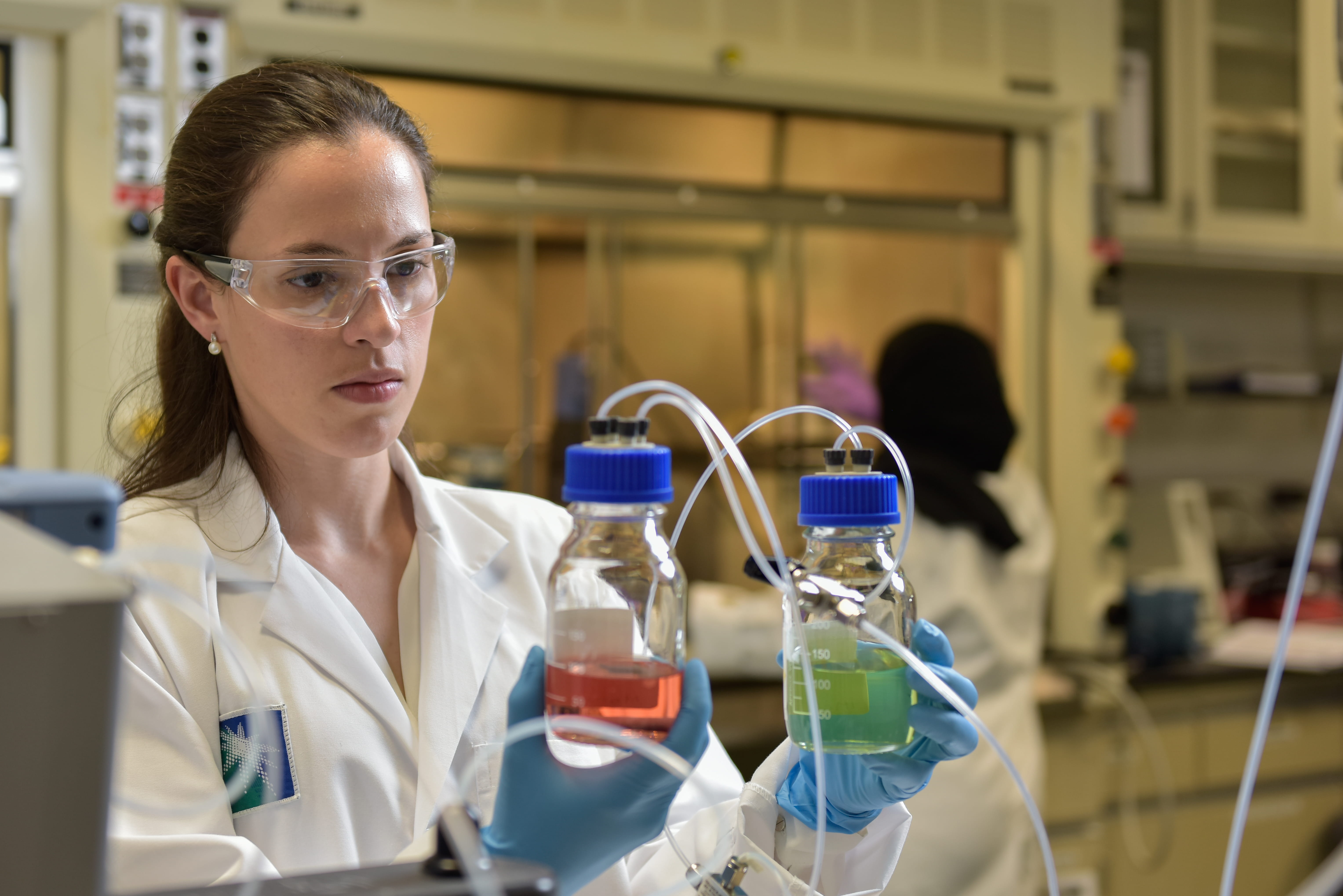 Saudi Aramco scientist analysing samples at the Research and Development Center